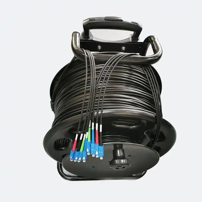 Carrete de cabo de fibra óptica retrátil portátil com comprimento 100M 200M 500M Cordão de parche de fibra óptica tática blindada